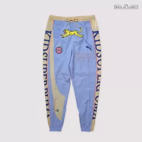 PUMA X KIDSUPER STUDIOS TRACK PANTS BRUNNERA BLUE - 598462-38